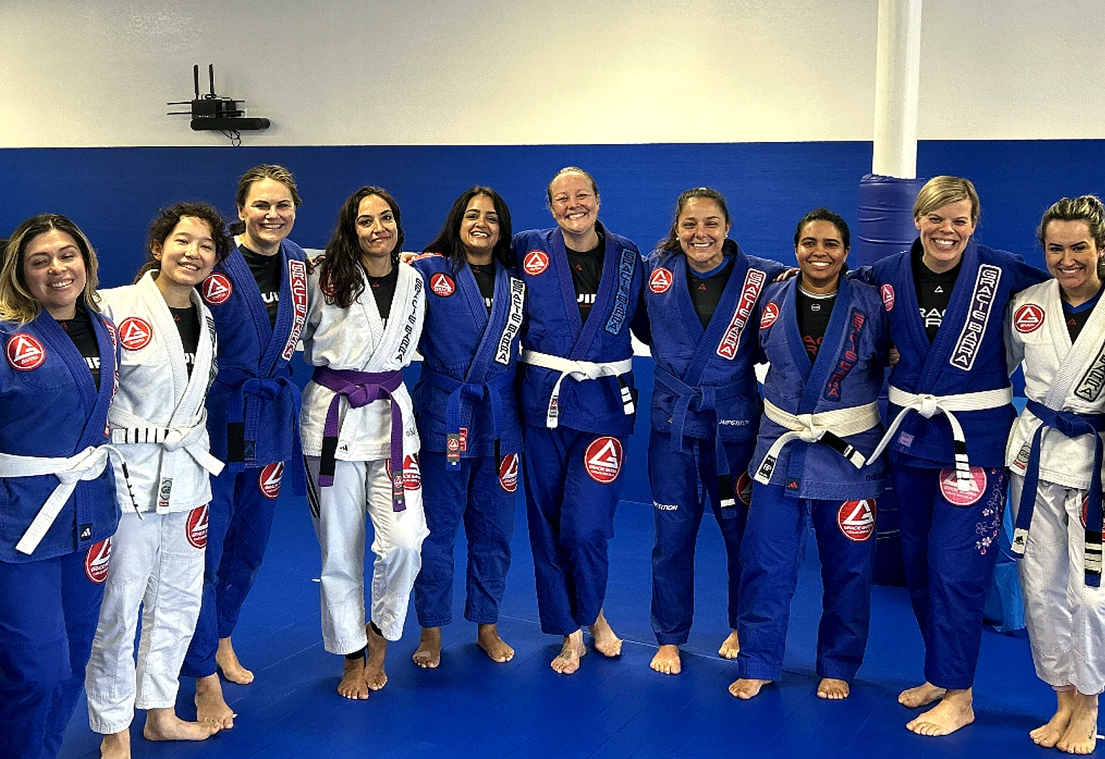 Women in gis posing together